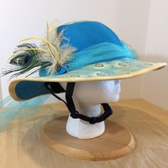 "CARRIAGE DRIVING HELMET HAT/COVER. Helmet not included Nothing in stock ready to ship Each hat is individually made to your specifications. You pick your colors and decorations. Decorations include a handmade ribbon or fabric flower, or silk flower; a feather pin with either a button or jewelry centerpiece; and hatband of netting, ribbon or fabric. Brim has a \"Soft Edge\" - no wire. Wire can be added upon request. *Photos are examples only. Prices start at $125.00 The hats attach to your helme Custom Adjustable Costume Hat For Kentucky Derby, Custom Adjustable Mini Hats For Kentucky Derby, Adjustable Brimmed Mini Hats For Outdoor, Brimmed Kentucky Derby Costume Hat, One Size, Carriage Driving, Helmet Hat, Helmet Covers, Horse Tips, Equestrian Outfits