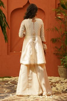 Chambeli | Ready To Wear | Luxury Formal Women Suits – Zaaviay Festive Peplum Lehenga With Embroidery, Festive Embroidered Peplum Lehenga, White Cotton Silk Sharara For Eid, Traditional Peplum Anarkali Set For Designer Wear, White Cotton Silk Festive Sets, Off White Anarkali Dress In Raw Silk, Embroidered Peplum Lehenga For Eid, Off White Raw Silk Anarkali Dress, Wedding Sharara With Chikankari Embroidery And Peplum Style