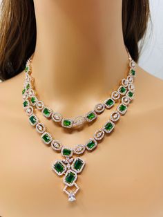 High quality Luxury Diamond, American Diamond Necklace with Emerald Green With Gold plating, Silver plating and Rose Gold plating. Lightweight and Elegant  Very beautiful party wear necklace set to put extra beauty in your look  Necklace length: 18 inches  Earrings length: 2.5 inches  Care instructions: Avoid Heat and Chemicals like perfume, Deo, Alcohol Etc| clean with Dry Cotton Cloth| Pack in An Air Tight Container After Use. *Disclaimer* ✨ product and color may slightly very due to photograp Dazzling Party Jewelry Sets With Diamond Accents, Party Bridal Necklace With 17 Jewels And Crystal, Glamorous Elegant Bridal Necklace For Party, Dazzling Diamond Necklace For Party, Dazzling Diamond Necklace For Party With Sparkling Stones, Fine Jewelry Cubic Zirconia Bridal Necklace For Party, Glamorous Handmade Necklaces For Celebration, Dazzling Hand Set Necklaces For Party, Fine Jewelry Diamond Necklace With Accents For Party