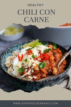 healthy chili con carne in a bowl with rice and cilantro on the side