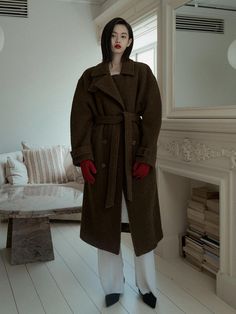 This belted double coat boasts exceptional insulation with its blend of 70% wool and alpaca, providing warmth and lightness for the coldest winter days.- Long length that makes your outfit stylish- Belted double coat design with oversized fit- Volume added with shoulder and sleeve lines Belted Wool Coat Outfit, Belted Wool Pea Coat, Belted Long Wool Pea Coat, Wool Belted Long Pea Coat, Double-breasted Wool Pea Coat With Belted Cuffs, Winter Wool Coat With Belted Cuffs For Work, Brown Double-breasted Outerwear With Belted Cuffs, Winter Wool Long Coat With Belt, Winter Long Belted Wool Coat