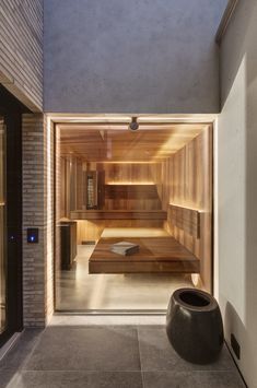 an indoor sauna is shown in this modern home