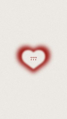 a red heart shaped object with the word ttt on it's left side