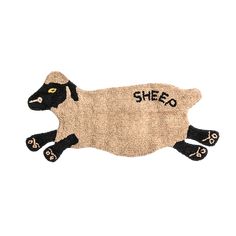 a sheep rug with black feet and the word shed on it's back legs