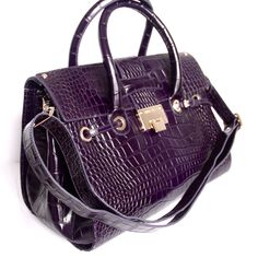 JIMMY CHOO   Purple Croc Stamped Leather Rosalie Satchel Bag Double top handles, 4.5" drop Adjustable detachable shoulder strap, 9¾"-23" drop Flap-lock closure Protective metal feet One inside zip pocket One inside open pocket Suede lining 13.5"W X 9.5"H X 7"D   Made In Italy.   Condition: New without tags.  This bag was a display, never worn or used.  Leather is clean and free of stains.  Inside the bag, on the lining there is a mark from a marker.  Please look at the pictures.    Msrp - $2190 Designer Top Handle Satchel With Hasp Closure, Designer Satchel With Hasp Closure And Top Handle, Top Handle Satchel With Hasp Closure For Shopping, Luxury Purple Shoulder Bag With Top Handle, Luxury Purple Shoulder Bag With Top Carry Handle, Purple Office Bag With Detachable Handle, Designer Top Handle Bag With Hasp Closure, Luxury Tote Bag With Hasp Closure, Luxury Satchel With Hasp Closure For Shopping