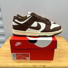 Spruce Up Your Sneaker Collection With These Nike Dunk Low Sneakers. These Sneakers Are Perfect For Various Occasions Including Casual Wear, Activewear, And Workwear. Women’s Us Shoe Size 7.5 And Uk Shoe Size 5. The Sneaker Is Brand New And Authentic, With No Signs Of Wear And Tear. 100% Authentic. Made In Vietnam. In-Hand Ready To Ship. No Major Flaws Seen. Brand New. Please See Pics Above For A Closer Look At Product. Legit Seller. Brown Sneakers With Boost Midsole And Round Toe, Brown Sneakers With Boost Midsole And Medium Fit, Nike Brown Sneakers With Contrast Sole, Nike Custom Brown Sneakers With Cushioned Footbed, Brown Sneakers With Contrast Sole, Brown Nike Sneakers With Rubber Sole, Brown Slip-on Sneakers For Streetwear, Nike Brown Low-top Custom Sneakers, Brown Custom Low-top Sneakers With Cushioned Footbed