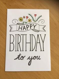 a card with the words happy birthday to you on it and flowers in the background