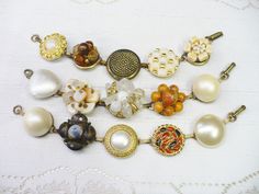 These gorgeous bracelets are fashioned from 'repurposed' vintage earrings. The earrings range from crystal clear rhinestones, faux pearls, ivory, crystals, Aurora Borealis, varying colors per set - gold accents, silver accents -- all on silver tone and gold tone . Great bracelet for that special occasion, bride or bridesmaid. Wedding APPEAL! AMAZING sparkle for the BRIDE or bridesmaid! They sit on a bracelet that is aprox. 7.25 inches long and is matte silver tone - nickel free and oxidized. I u Vintage Metal Bracelets For Weddings, Vintage Adjustable Jewelry For Wedding, Handmade Vintage Wedding Bracelets, Vintage Handmade Wedding Bracelets, Adjustable Vintage Wedding Jewelry, Vintage Adjustable Wedding Jewelry, Vintage Wedding Bracelet Jewelry, Vintage Jewelry Bead Caps For Jewelry Making, Vintage Jewelry With Bead Caps And Round Beads