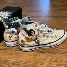 Wonder Woman Converse High Top Sneakers - M4/W6 - Brand New!! Worn Maybe To Try On At Store (Journeys - Tag On Bottom). Comes With Both Pairs Of Laces And Og Box!!! These Are A Size M4/W6 - Graded 10/10!!! Smoke Free Home - In A Temperature Controlled Area Of My Home! Huge Ww Fan, The Shoes Were Just A Little Too Small For Me! - Quick Shipping! Ask Questions Below. I Will Not Answer If It’s Available, If It’s Listed Not Sold It’s Available! Converse Custom Sneakers With Boost Midsole And Round Toe, Converse Custom Sneakers With Boost Midsole, Converse High Top, Converse White, Converse High, Womens Converse, Converse High Top Sneaker, Converse Shoes, Try On