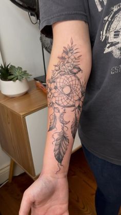 a person with a tattoo on their arm