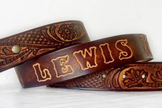 Engraved Leather Belt - Personalized Father's Day Gift with Name - A great gift for him or her! Western style personalized leather belt with custom name - up to 7 characters. Perfect for Father's Day, Anniversary, Groomsmens gifts and all occasions. Genuine Leather belt, Tooled, hand dyed, personalized with your name.AVAILABLE CHARACTERS:English alphabet : A B C D E F G H I J K L M N O P Q R S T U V W X Y ZNumbers are NOT available to be embossed onto belts.MAXIMUM OF 7 LETTERS. (spaces do not c Police Tactical Gear, Tooled Belt, Muscle Supplements, Police Tactical, Leather Tool Belt, Tie Ideas, Custom Leather Belts, Military Belt, Pirate Outfit