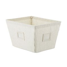 a white striped storage basket with two square handles