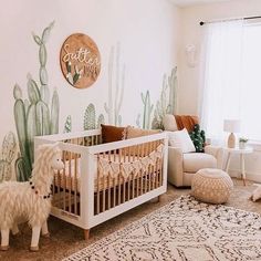 a baby's room decorated in cactus theme