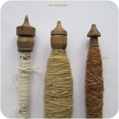 three spools of twine next to each other