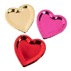 three heart shaped foil plates sitting on top of each other