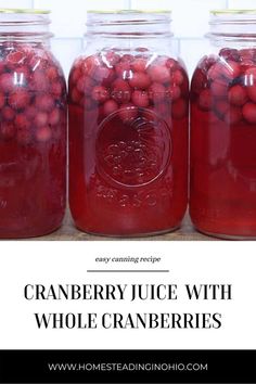 cranberry juice with whole cranberries in jars