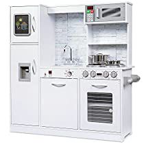 a white play kitchen set with appliances and cupboards on the wall, in front of a white background