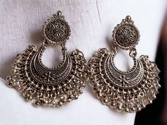 Beautiful  Jhumkas One of a kind  Very well made and beautiful  Excellent condition  These hang 2.5 inches Very beautiful design Rustic silver color Handmade and sturdy Handmade Silver Metal Jhumkas, Silver Dangle Jhumkas For Festival, Silver Jhumkas With Latkans For Festival, Elegant Silver Jhumkas For Festival, Silver Metal Chandbalis As Gift, Silver Chandbali Jhumkas For Festivals, Bohemian Silver Metal Jhumkas, Silver Chandbali Danglers With Intricate Design, Silver Chandbalis For Festival