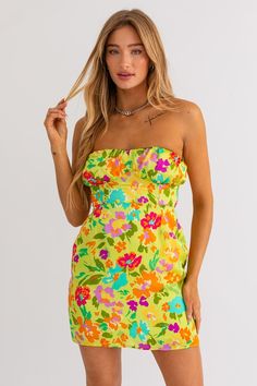 Ready for a dose of vacation bliss? Our Vacay Vibes Mini Dress is your ticket to a stylish getaway! Pack this must-have mini dress for your next adventure, and let it be a reminder of sun-kissed days and unforgettable memories. 100% Polyester Color: Lime Green Floral Print Strapless Back Tie Tube Style Mini Length Vacay Vibes, Kiss Day, Green Floral Print, Green Mini Dress, See You Again, Tube Dress, Orange Dress, Floral Mini Dress, Sun Kissed