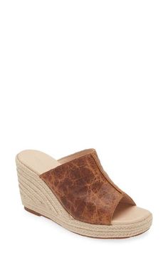 A distressed leather upper creates a lived-in aesthetic on an espadrille-inspired slide sandal lifted by a jute-wrapped platform and wedge heel. 3" heel; 3/4" platform Cushioned footbed Leather upper and lining/rubber sole Imported In Aesthetic, Espadrilles Platform, Platform Wedge Sandals, Platform Wedge, Distressed Leather, Wedge Sandal, Sandal Women, Platform Wedges, Slide Sandals