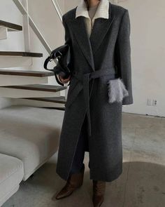 Polished, oversized structured overcoat in a classic wool alpaca fabrication. - Oversize cut- Notched lapel- Padded shoulders- Tie waist- Front flap pockets- Buttoned cuffs- Fully lined- Back vent- Measurements: Length 47.5", Bust 44", Shoulder 17.5" Sleeve 31"- Outer: Shetland Wool 80%, Baby Alpaca 10%, Nylon 10%- Dry clean- Imported Formal Wool Coat With Belted Cuffs And Lapel Collar, Formal Wool Coat With Belted Cuffs And Notch Lapel, Formal Long Wool Coat With Belted Cuffs, Office Wool Coat With Notch Lapel And Belted Cuffs, Office Wool Coat With Belted Cuffs And Lapel Collar, Oversized Wool Coat For Formal Winter Occasions, Business Wool Coat With Belted Cuffs And Notch Lapel, Business Wool Coat With Notch Lapel And Belted Cuffs, Elegant Oversized Wool Coat With Pockets