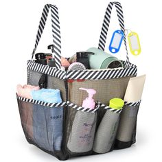 a black and white striped bag filled with personal care items