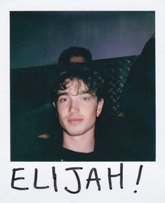 a polaroid photo of a young man with the word elishah written on it