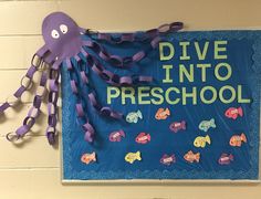 a bulletin board with an octopus and fish on it that says dive into preschool