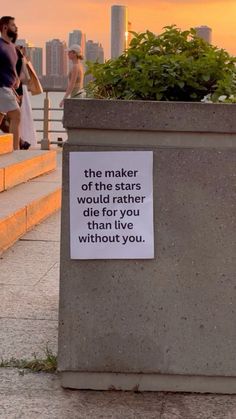 a cement planter with a sign that says the maker of the stars would rather be you than i have lived without you