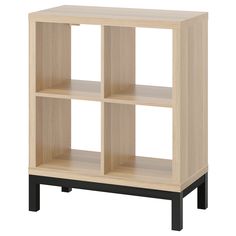 a wooden shelf with three shelves on one side and two black legs, against a white background