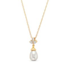 Timeless and elegant, this Three Stone Pearl Pendant Necklace features a pearl beneath three pear cut diamonds totaling 0.15 carats. Elegant Pear-shaped Diamond White Necklace, Elegant Teardrop Pearl Necklace, Pear-shaped Diamond Necklace For Formal Occasions, Pear-shaped Diamond Necklace For Formal Events, Formal Pear-shaped Pearl Necklace, Elegant Diamond Teardrop Pendant Necklace, Elegant White Diamond Teardrop Pendant Necklace, Elegant Teardrop Pendant Diamond Necklace, Elegant Teardrop Diamond Necklace