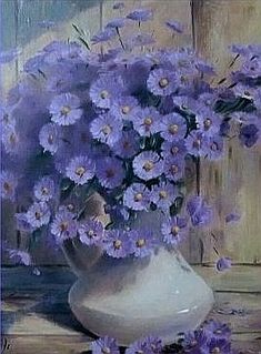 an oil painting of purple flowers in a white vase on a table with wood planks