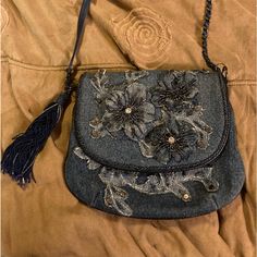 8.5” X 2” X 6.5” Strap Length End To End 46” Drop Length 22” Only Used A Few Times Small Discolored Area As Shown In Picture Blue Embroidered Denim Bags, Blue Denim Evening Bags, Mary Frances Bags, Good Jeans, Mary Frances, Denim Flowers, Beaded Handbag, Best Jeans, Handbag Purse