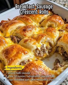 a casserole dish with meat and cheese in it on a counter top, labeled breakfast sausage crescent rolls