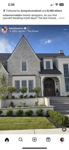 the front of a house is shown with an instagramt to it's owner