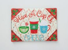 a ceramic tile with coffee cups and the words have a cup of cheer on it