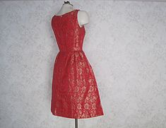 APPROXIMATE MEASUREMENTS (INCHES): Current Size: XS/S Bust: 34 Waist: 24 Hip: OPEN Bodice (shoulder to waist): 15 Skirt (waist to hem): 23 1/2 CONDITION Excellent DESCRIPTION 1960s cocktail dress Red and gold floral brocade fabric Back plastic zip closure Hand made; unlined Beautiful structure -- full skirt stands on its own; photographed without additional crinoline Vintage Brocade Dress With Historical Design, Red Embroidered Brocade Set, 1950s Brocade Dress, 1960s Cocktail Dress, Clown Dress, 1960s Brocade Dress, Tiki Dress, 1968 Pink & Orange Dress, Betty Dress