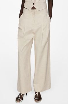 Enjoy the breathable feel of these cotton and linen pants that are a smart and stylish choice for the warmer seasons. Zip fly with hook-and-bar closure Front slant pockets; back welt pockets 71% cotton, 29% linen Machine wash, line dry Imported Beige Cotton Wide Leg Pants For Work, Beige Linen Wide Leg Pants For Fall, Chic Linen Workwear Bottoms, Neutral Cotton Wide Leg Pants For Work, Chic Linen Bottoms For Work, Chic Linen Pants For Work, Chic Linen Bottoms For Business Casual, Beige Linen Bottoms For Work, Linen Wide-leg Workwear Pants