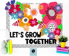 there is a sign that says let's grow together next to some books and plants