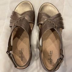 Never Worn! No Box Or Tags. Beautiful Pewter Metallic Color. Comfortable Gold Open Toe Sandals, Casual Metallic Sandals For Summer, Casual Metallic Sandals For Spring, Fabric Sandals, Black Open Toe Heels, Clarks Sandals, Pewter Metal, Walking Sandals, Brown Leather Sandals