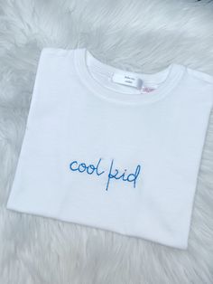 Personalized white tee for kids Since 12-18 months to 14 years old. After this age we have got the same product for adult White T-shirt With Letter Embroidery For Gift, White T-shirt With Letter Embroidery As Gift, Cotton T-shirt With Letter Embroidery For Birthday, White T-shirt With Embroidered Graphics As Gift, White Embroidered T-shirt For Gift, White Embroidered T-shirt As Gift, White T-shirt With Letter Embroidery For Birthday, Cute White T-shirt With Custom Embroidery, White Cute T-shirt With Custom Embroidery