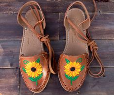 Womens brown sunflower embroidered leather closed toe lace up flat mexican sandals Brown Lace-up Sandals With Leather Sole For Spring, Brown Huarache Sandals With Leather Sole For Summer, Brown Lace-up Sandals With Leather Sole, Summer Huarache Sandals With Rubber Sole, Brown Lace-up Sandals With Round Toe For Spring, Huarache Sandals With Rubber Sole For Beach In Spring, Brown Lace-up Sandals With Leather Sole And Round Toe, Brown Closed Toe Lace-up Sandals For Summer, Casual Embroidered Huarache Sandals For Spring