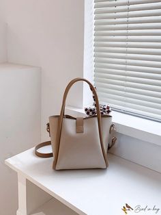 BirdinBag - Stylish Turn Lock Bucket Bag with Inner Pouch - Perfect Mothers Day Gift Beige Square Box Bag For Gift, Square Beige Box Bag For Gift, Square Bucket Bag With Detachable Handle As Gift, Square Bucket Bag With Detachable Handle, Handheld Beige Box Bag For Gifts, Trendy Beige Bags For Daily Use, Trendy Beige Bags For Daily Life, Beige Bucket Box Bag For Gifts, Beige Bucket Box Bag As Gift