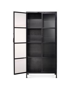 a black and white bookcase with doors open