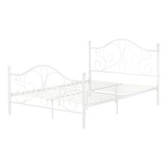 a white metal bed frame with scroll designs