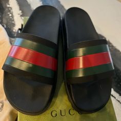 Brand New Men’s Gucci Slides. Black Rubber With Green And Red Web, Molded Rubber Footbed, Rubber Sole, Flat Authentic Gucci, Made In Italy Comes With Box And Dust Bag Ships From The Boston Area. Designer Black Sandals With Red Sole, Designer Gucci Slides With Rubber Sole, Gucci Designer Leather Slides, Gucci Black Sandals With Rubber Sole, Black Gucci Slides With Rubber Sole, Black Gucci Sandals With Rubber Sole, Gucci Leather Slides With Rubber Sole, Designer Black Slides With Rubber Sole, Designer Black Flat Slides