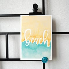 a card with the word beach written on it