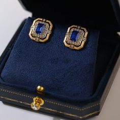 Featuring a delicate square design, these matte gold square hollow diamond wrapped sapphire stud earrings are crafted in matte gold with intricate diamond detailing and a stunning sapphire in the center. Unique cutout patterns add a modern touch to a classic silhouette. Metal: 18K Recycled Gold Plated Vermeil on Recycled Sterling Silver Gemston: Diamond,Cubic Zirconia Earring Diameter: 15mm Single Weight: 3.5g Sapphire Stud Earrings, Edison Pearls, Sapphire Earrings Studs, Sapphire Studs, Cubic Zirconia Earrings, Tiger Eye Stone, Recycled Gold, Recycled Sterling Silver, Classic Silhouette