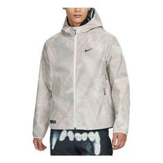 Nike Storm-FIT Running Division Running Jacket 'Grey White' FB8551-030 Nike Gray Sports Outerwear, Nike Gray Outerwear For Sports, Nike Gray Windbreaker For Winter, Nike Casual Gray Outerwear, Functional Gray Outerwear For Spring, Functional Gray Spring Outerwear, Gray Functional Spring Outerwear, Nike Gray Casual Windbreaker, Casual Gray Nike Windbreaker