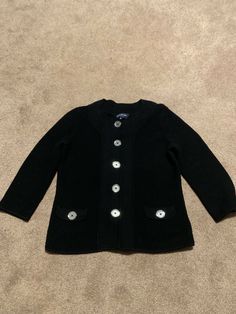 This Jones New York cardigan is in excellent condition. It is a size large and is black. Smoke free home. Vintage Cardigan With Buttons For Work, Classic Black Outerwear With Buttoned Pockets, Winter Workwear Sweater With Snap Buttons, Snap Button Sweater For Winter Workwear, Vintage Buttoned Cardigan For Work, Vintage Cardigan With Button Closure For Work, Classic Black Single Breasted Cardigan, Vintage Button Closure Cardigan For Work, Vintage Sweater With Button Closure For Work